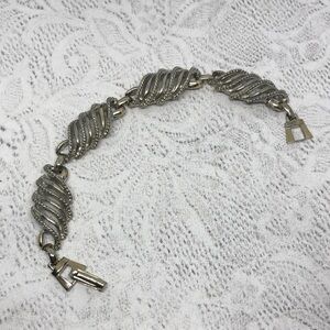 VINTAGE swirl twist metal chain link bracelet costume silver tone